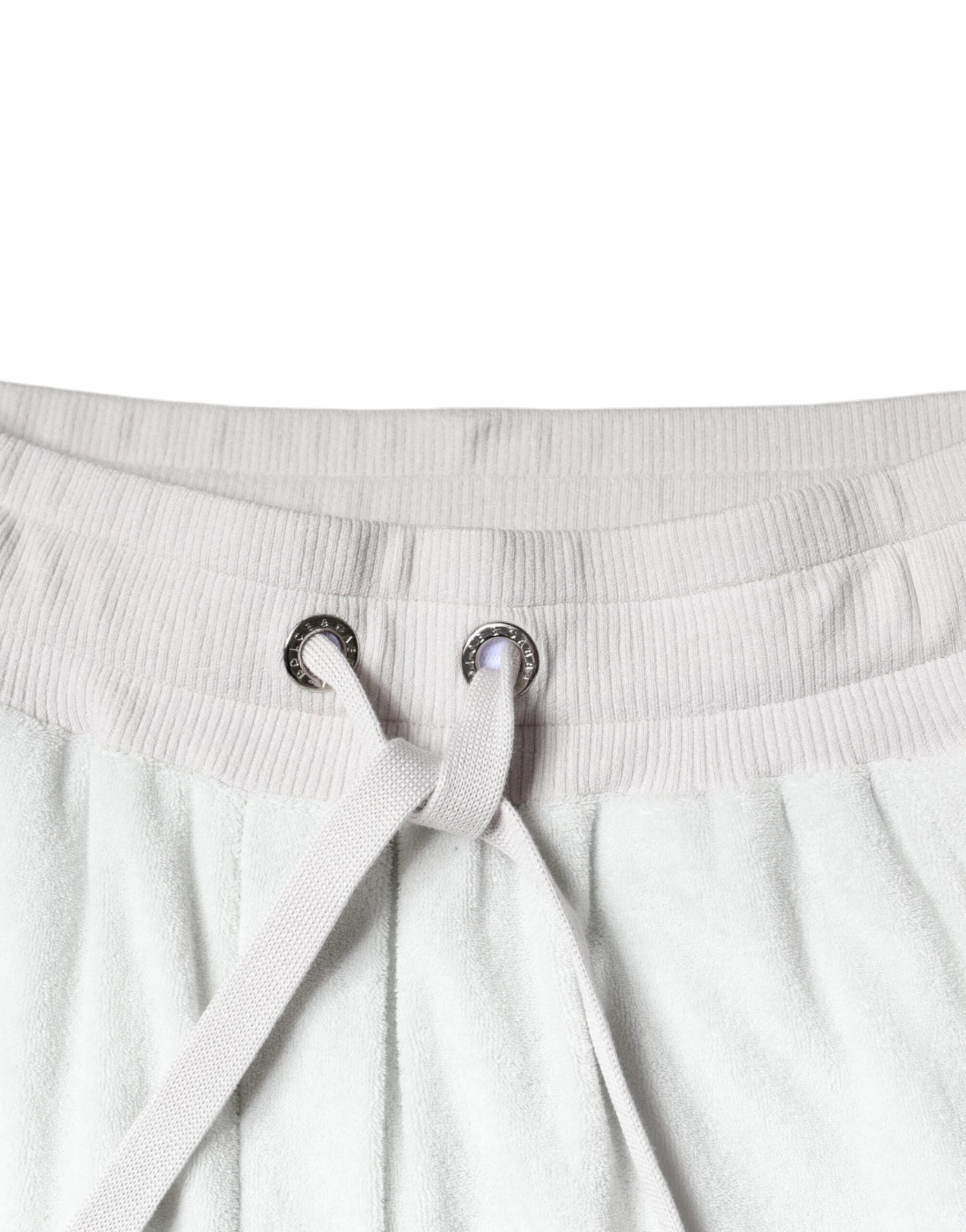 Vita joggingbyxor i nylon