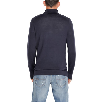 Calvin Klein blå ull polotrøye