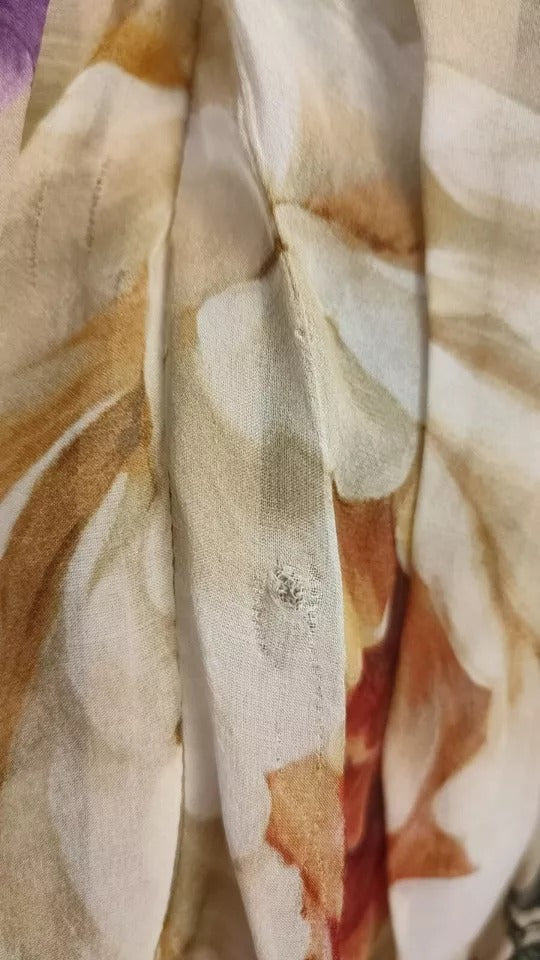 Beige blommig ärmlös a-linjeformad miniklänning