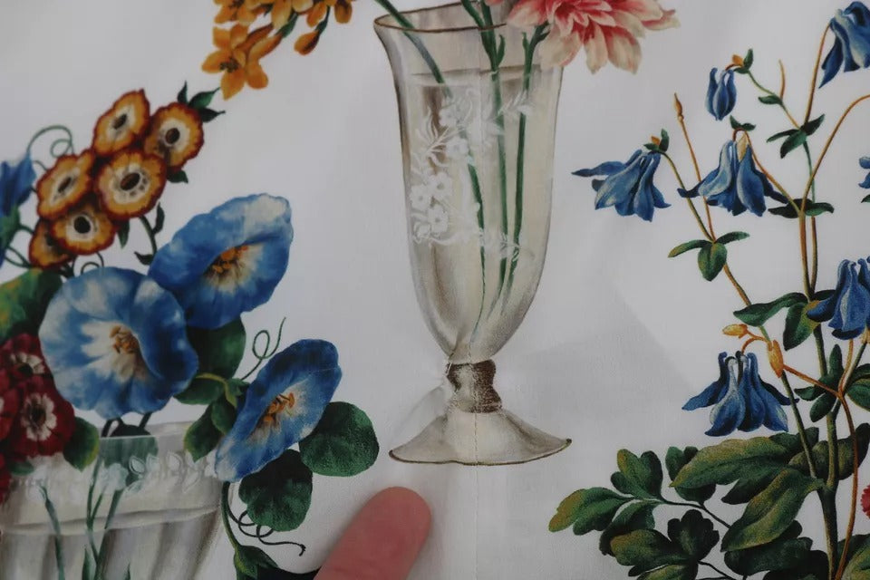 Vit spetsblommig vasskiftklänning