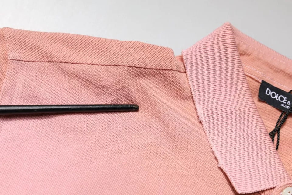 Rosa pikétröja med kort ärm och kronkrage