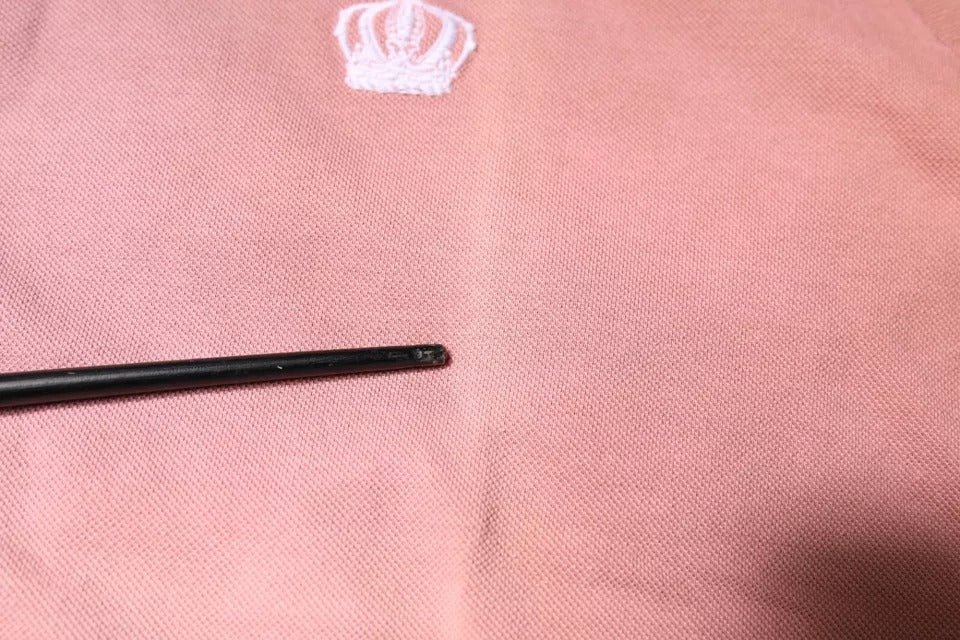 Rosa pikétröja med kort ärm och kronkrage