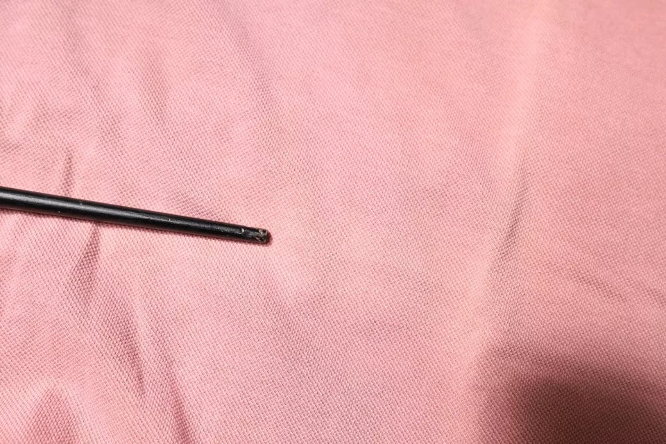 Rosa pikétröja med kort ärm och kronkrage