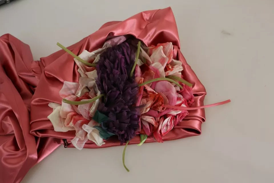 Rosa draperad midiklänning med blomapplikationer