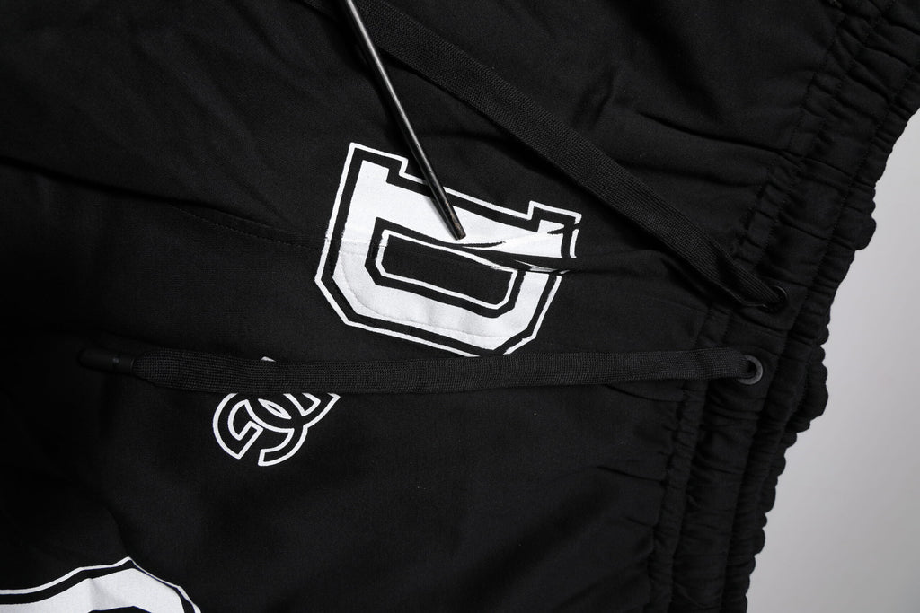 Svarta Bermuda-shorts med logotyp och bomull