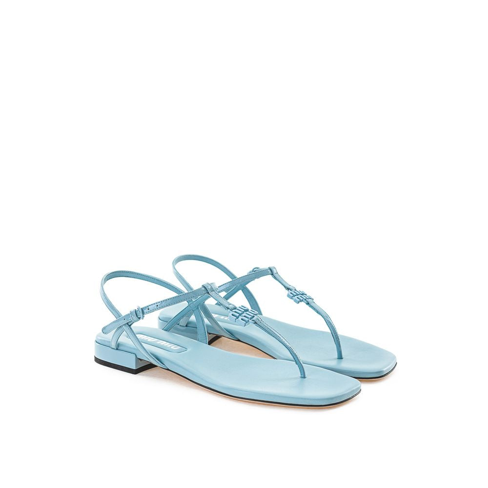 Blå flip-flop-sandal i lackläder