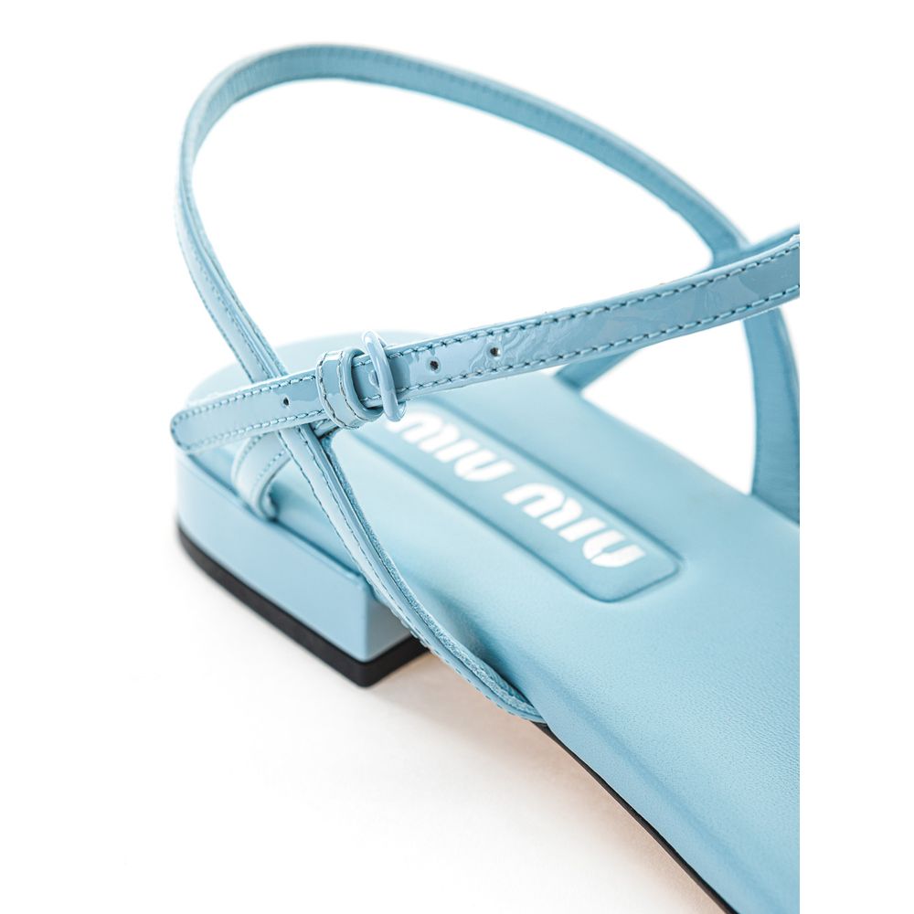 Blå flip-flop-sandal i lackläder