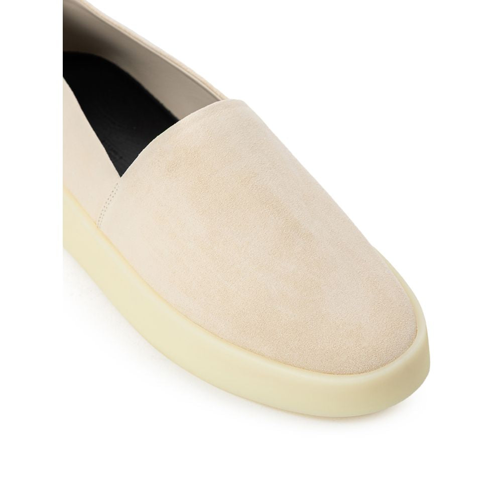 Beige slip-on loafers i skinn