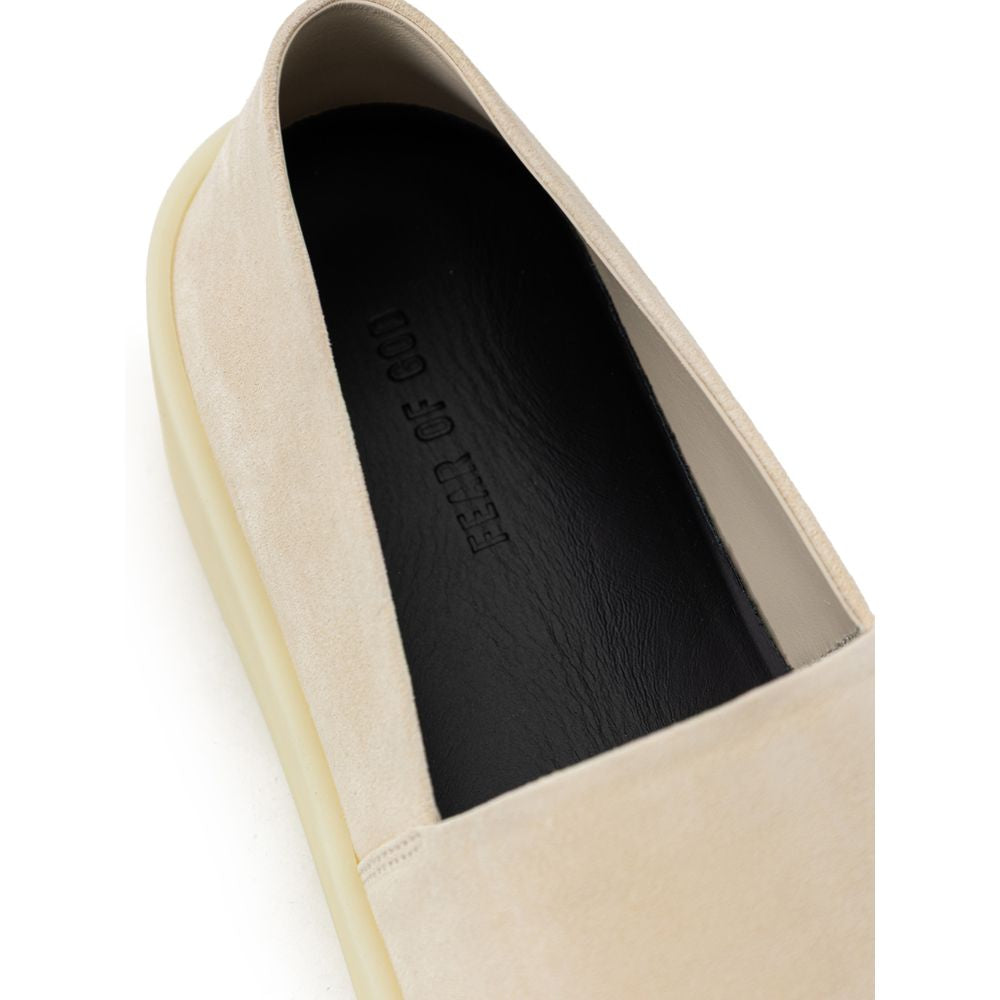 Beige slip-on loafers i skinn