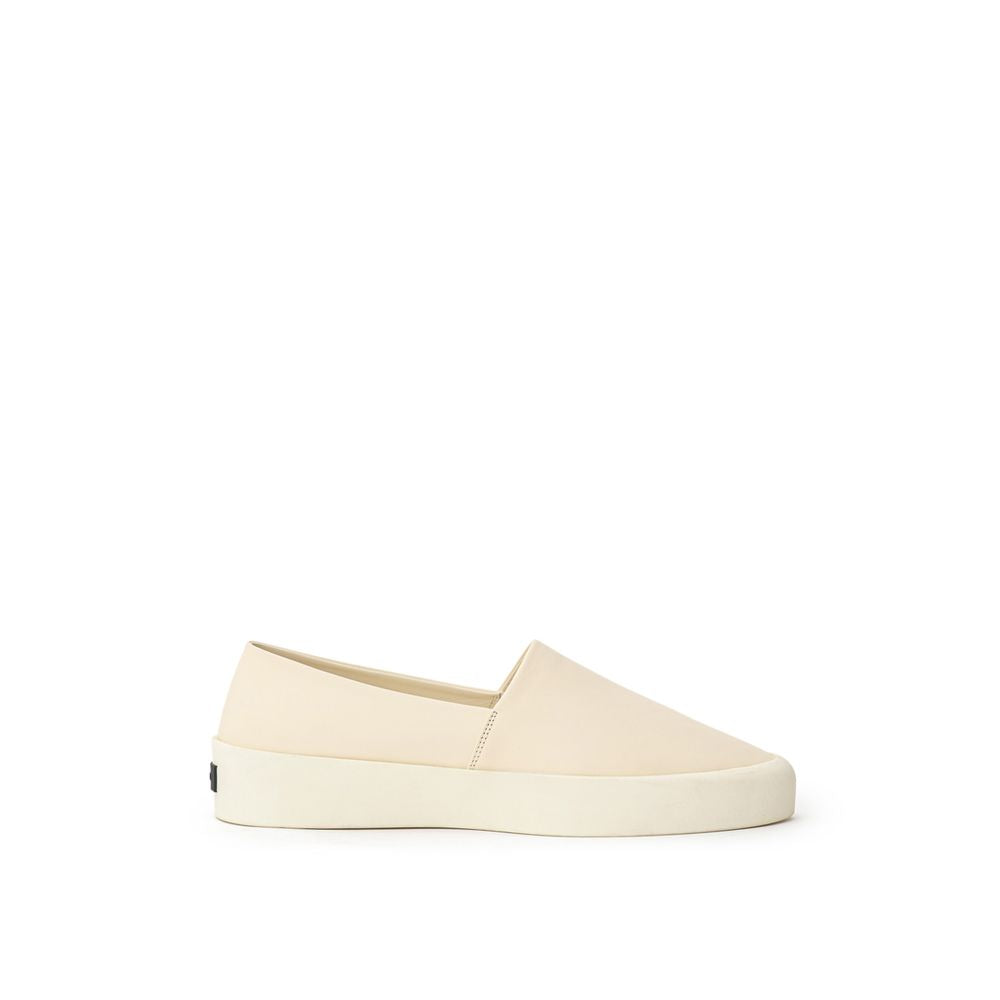 Beige slip-on loafers i skinn