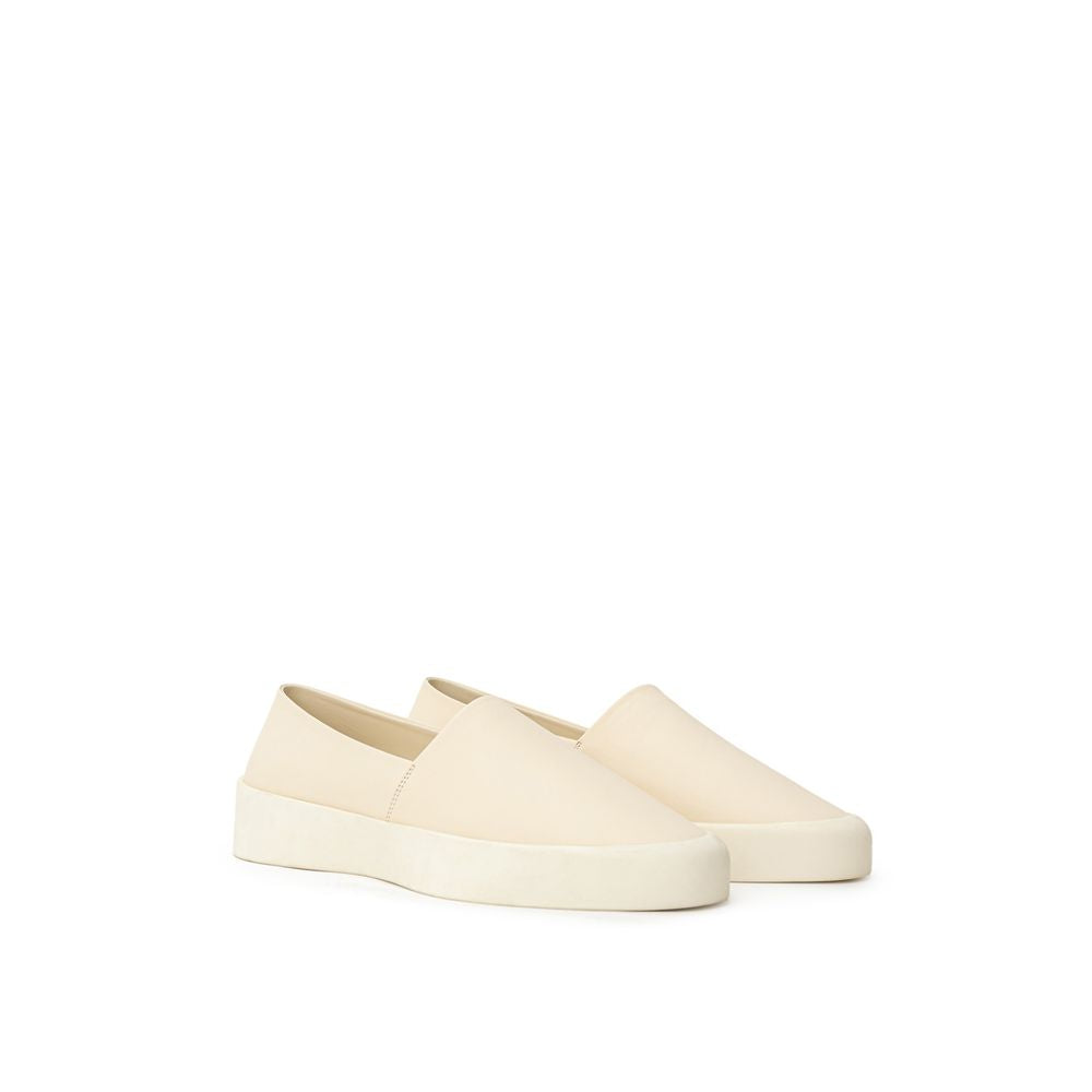 Beige slip-on loafers i skinn