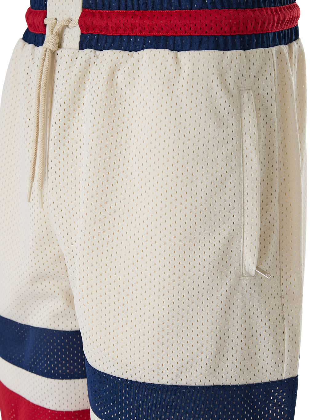 Krämfärgade polyestershorts med logotyp