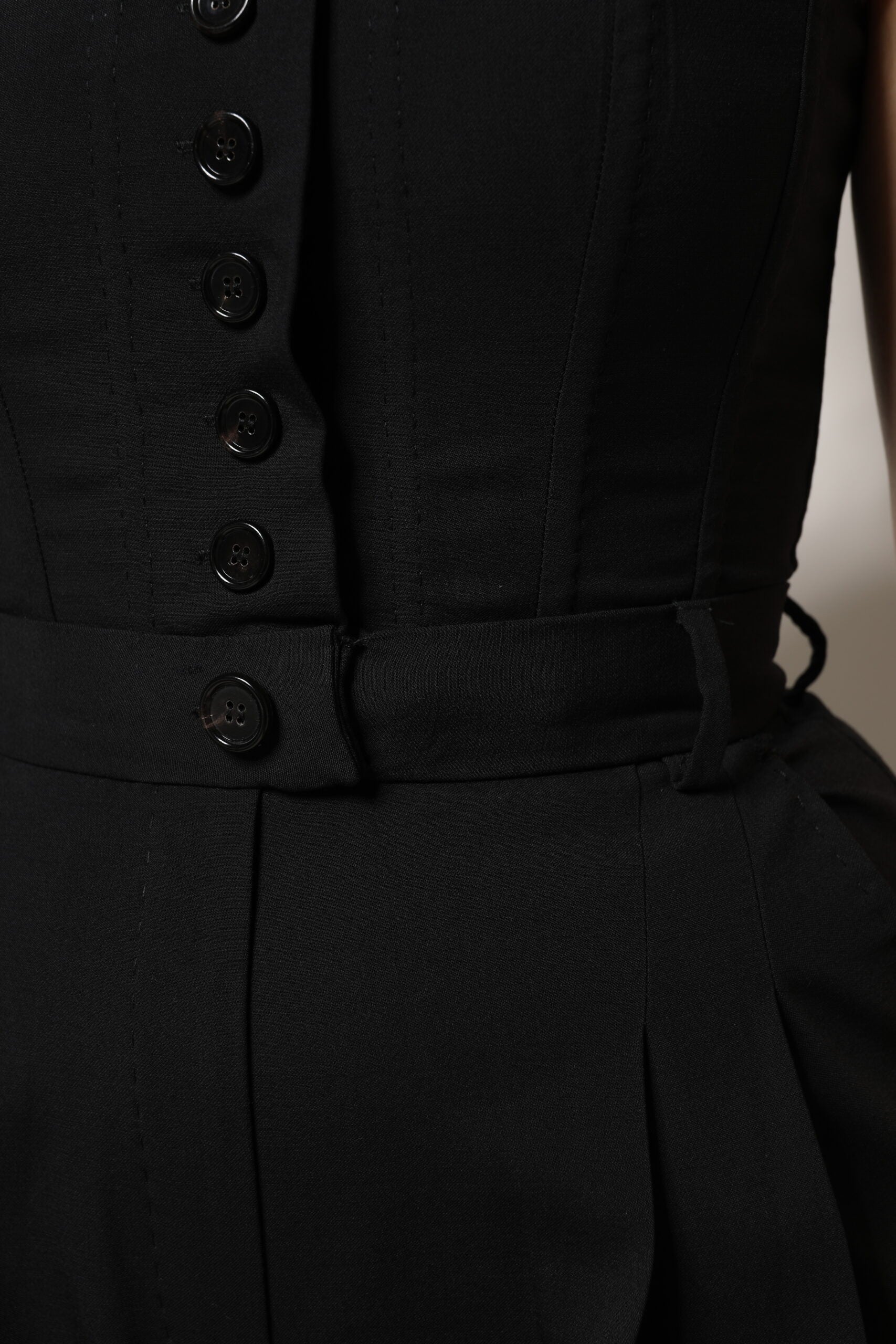 Svart axelbandslös jumpsuit i ull