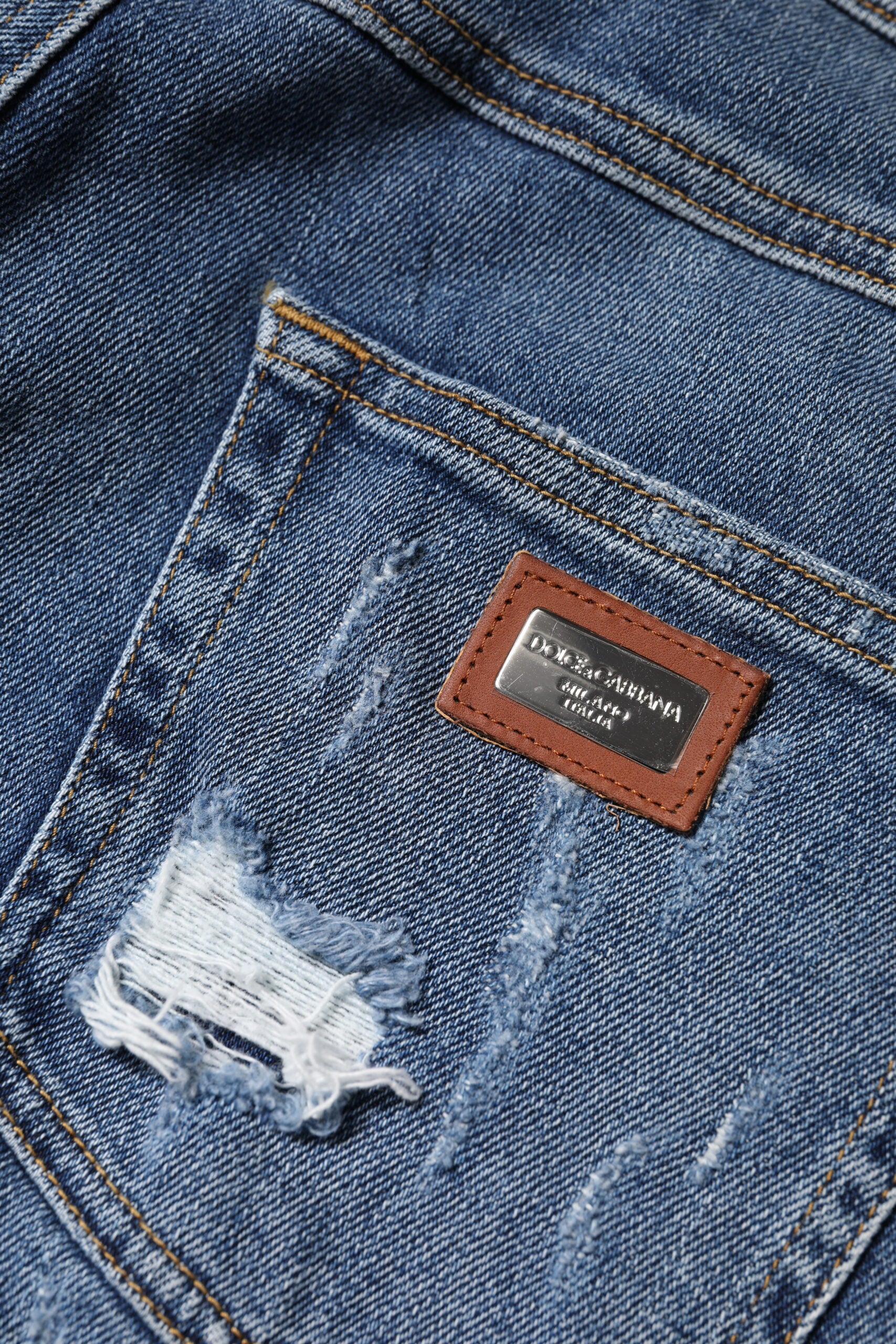 Blåa trasiga bomullsjeans med låg midja