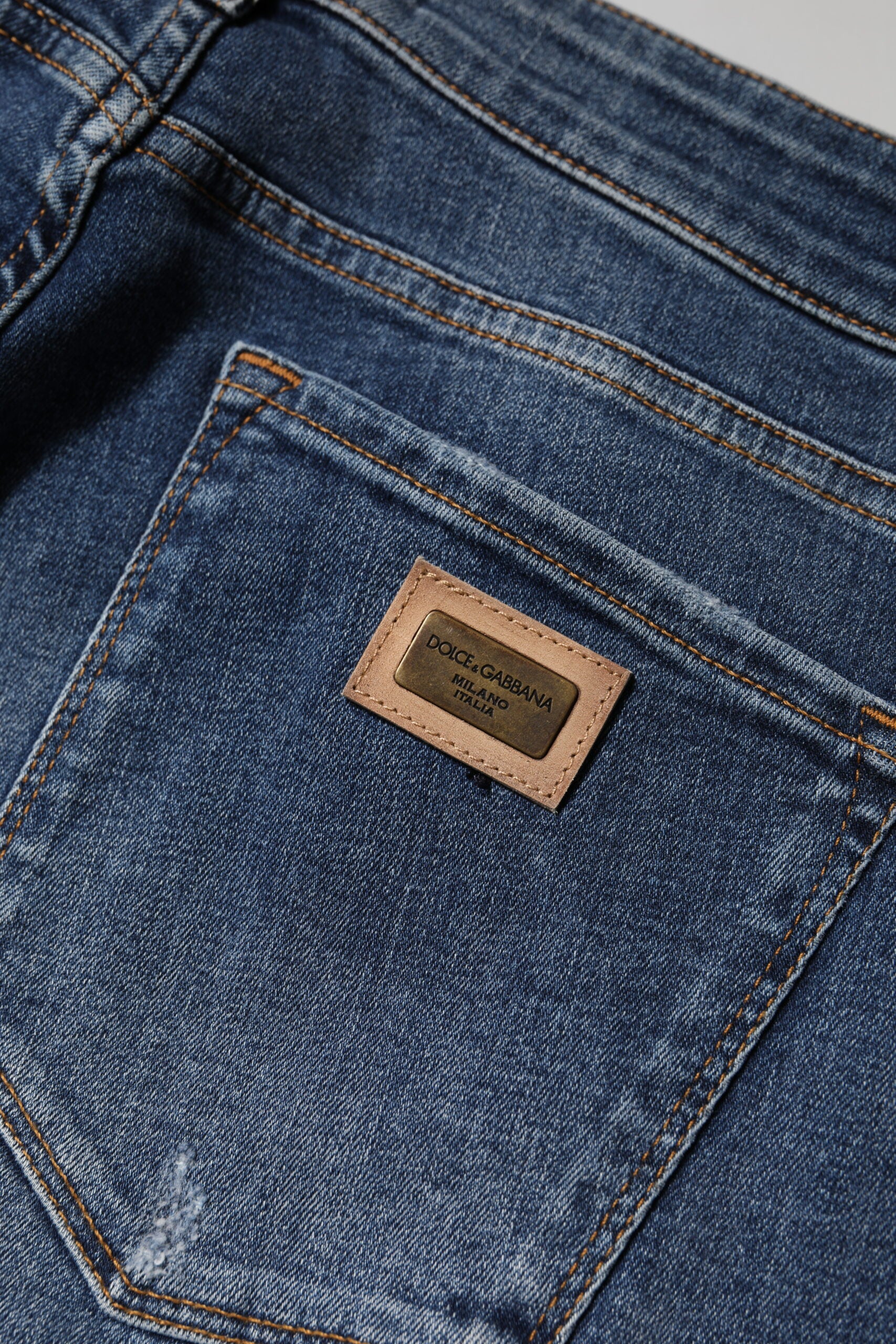 Blå tvättade bomullsjeans med låg midja