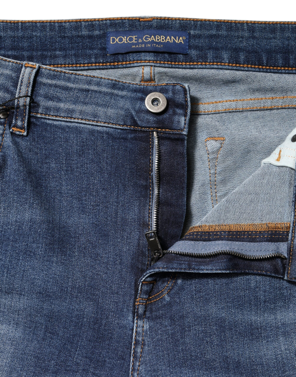 Blå tvättade bomullsjeans med låg midja