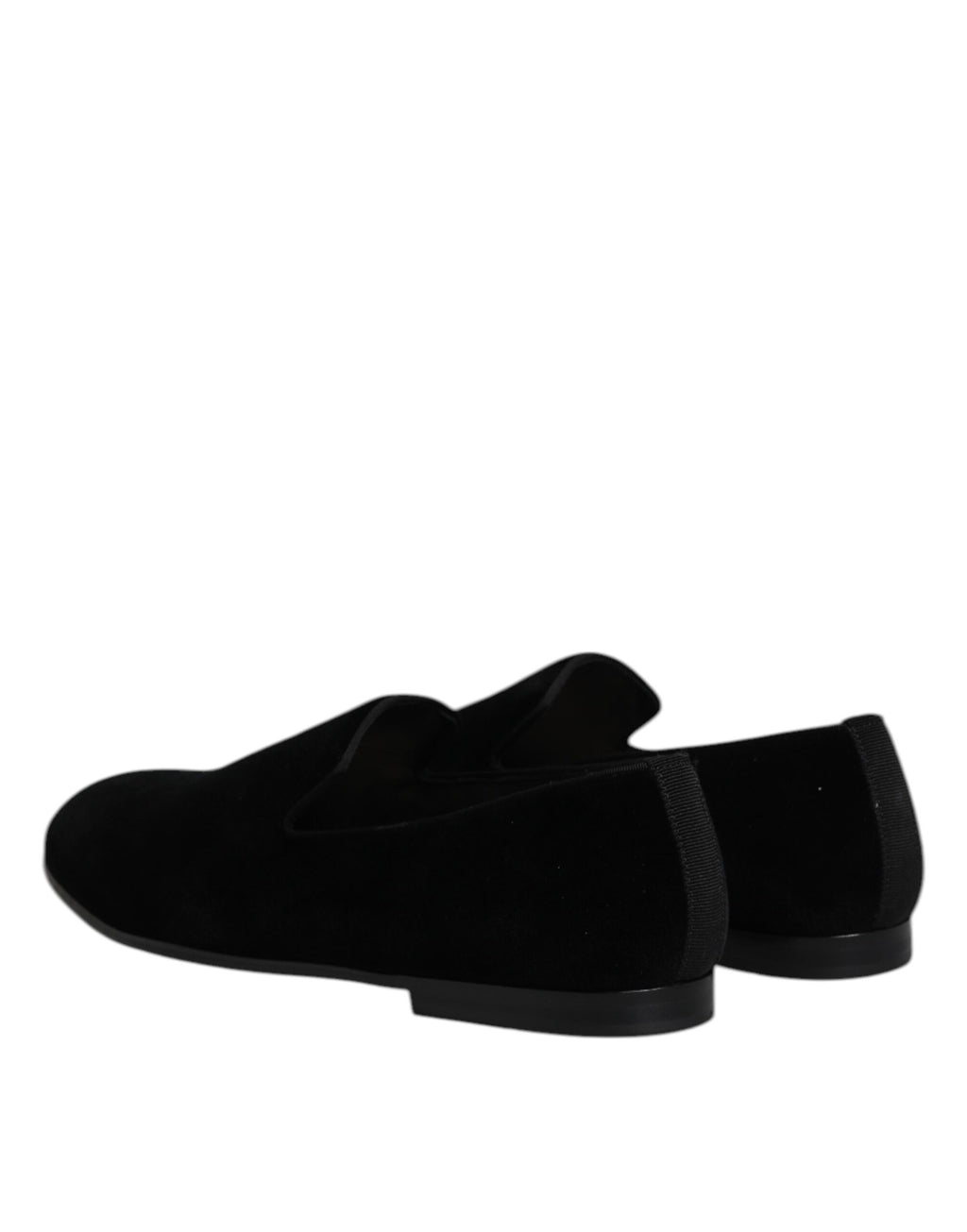 Svarta sammetsslip-on loafers i formskor