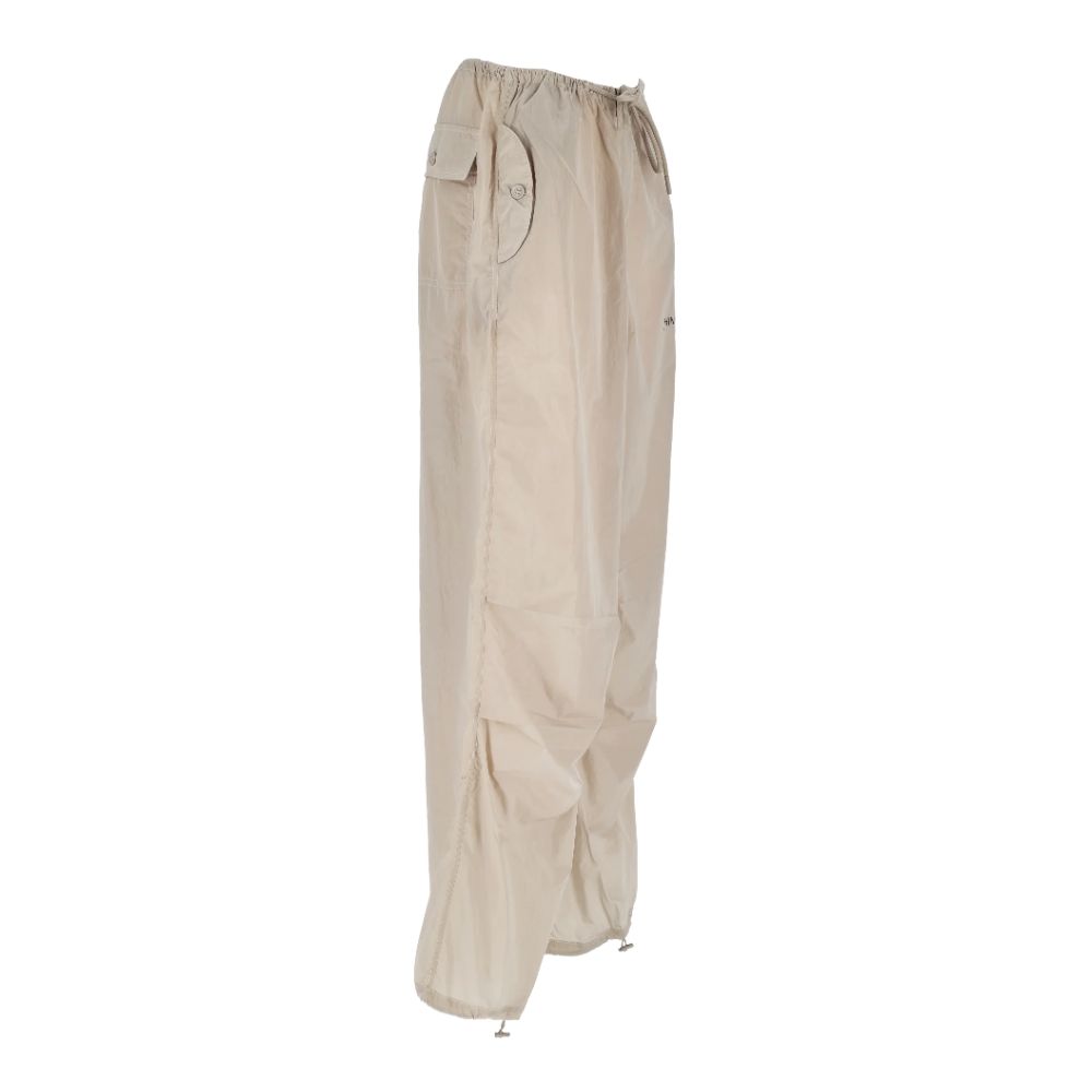 Beige nylonjeans och byxor