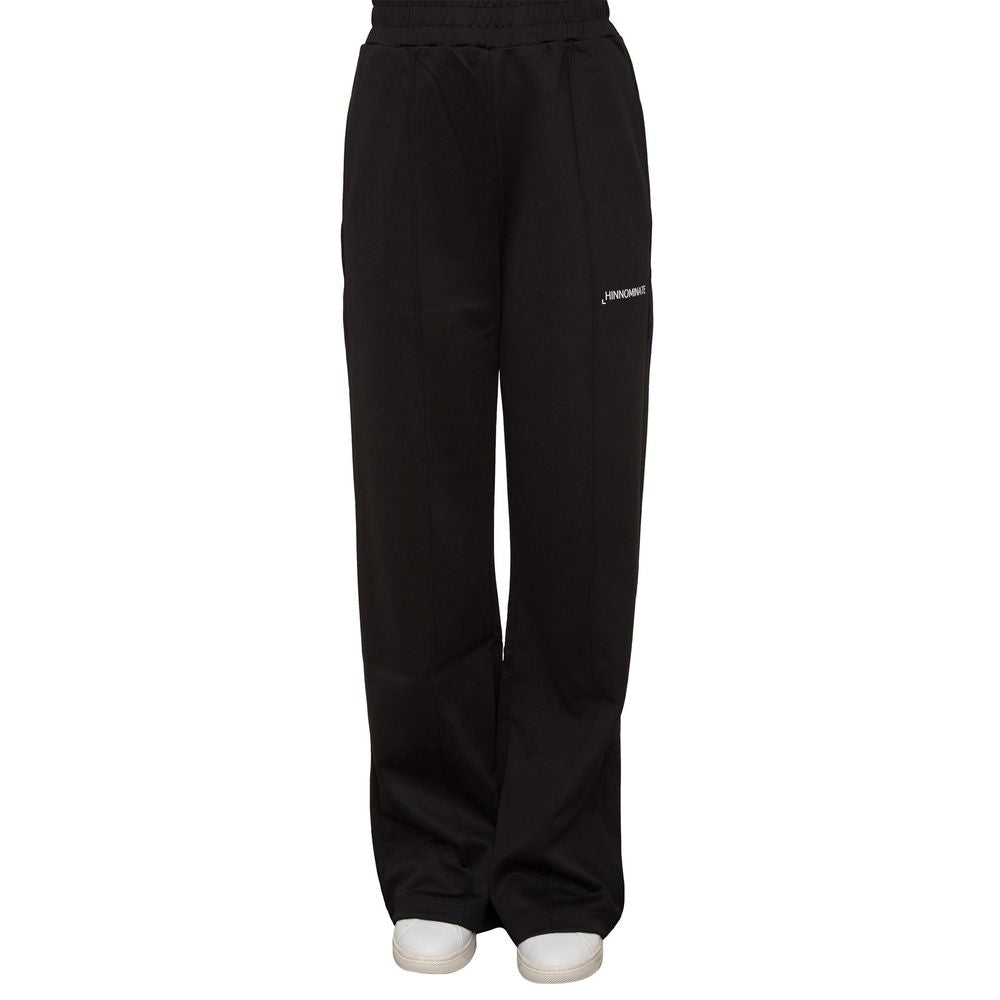 Svarta polyesterjeans och byxor