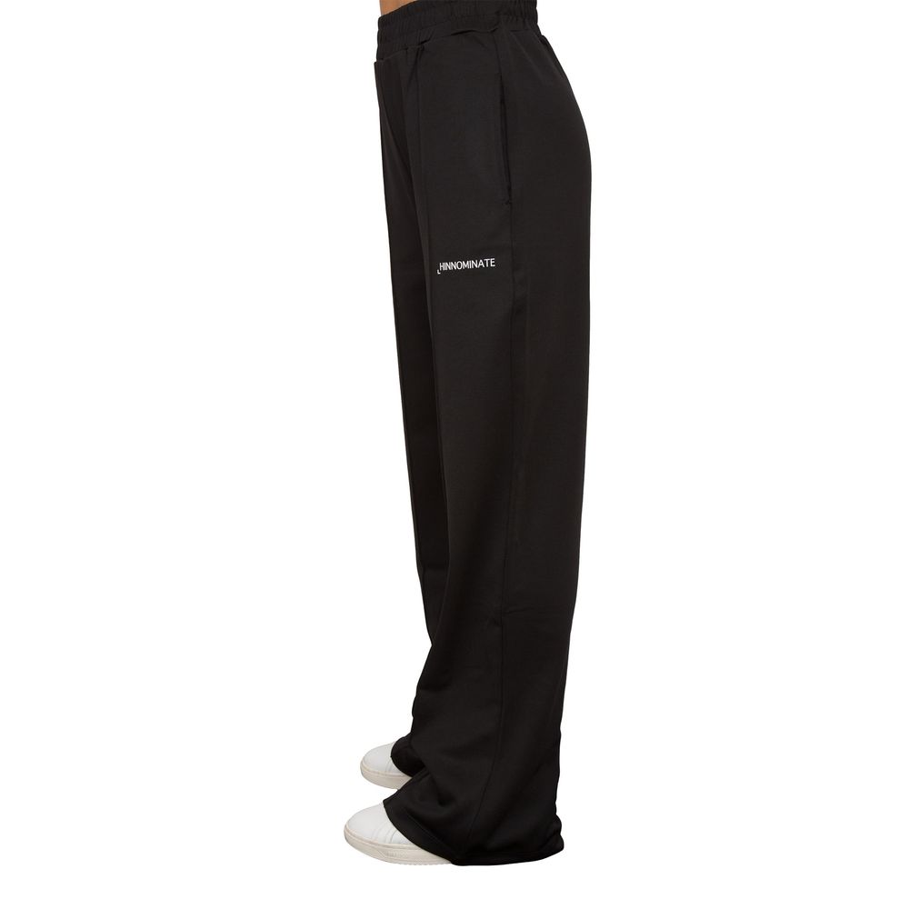 Svarta polyesterjeans och byxor