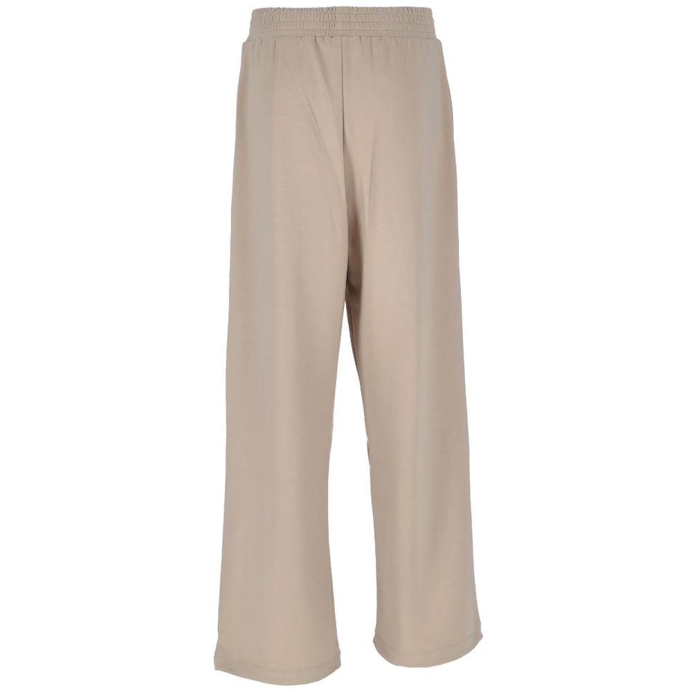 Beige polyesterjeans och byxor