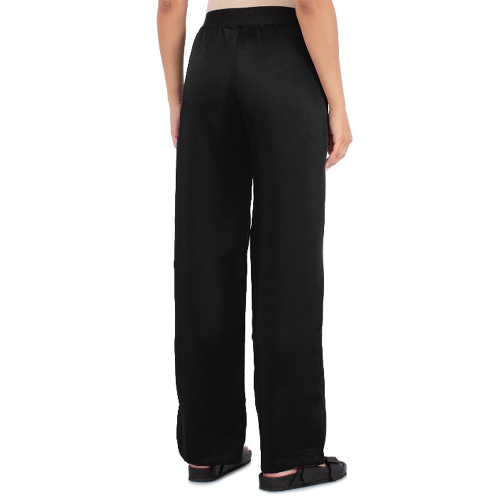 Svarta polyesterjeans och byxor