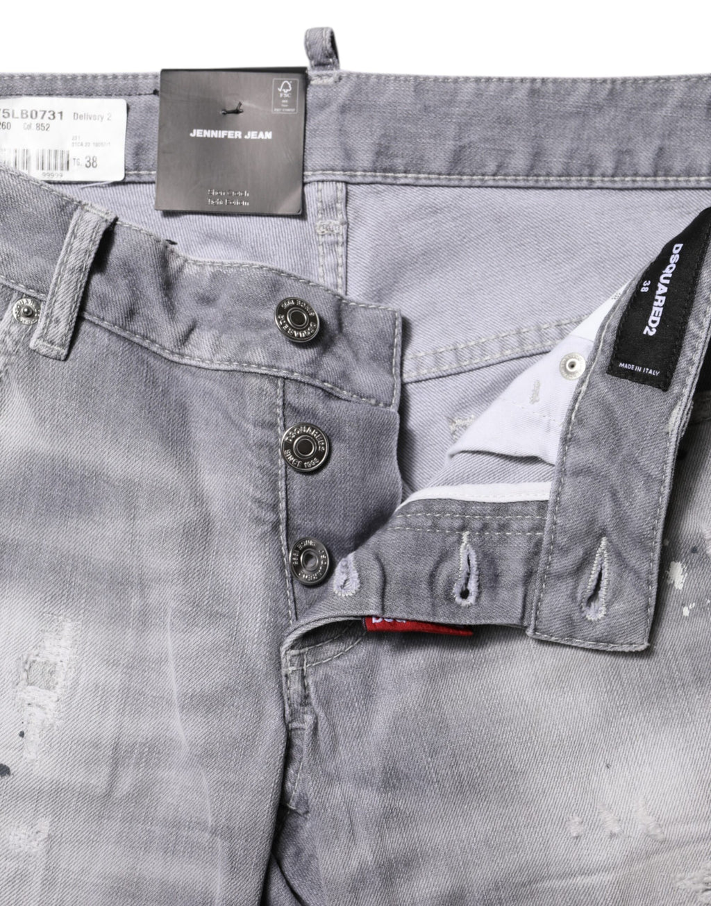 Grå tvättade avsmalnande jeans med medelhög midja