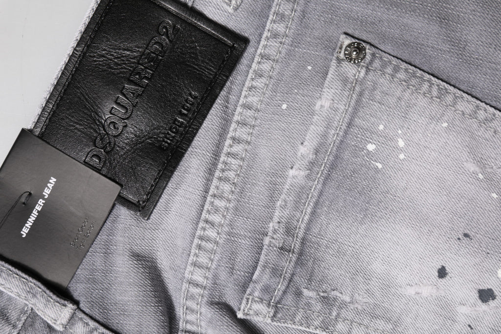 Grå tvättade avsmalnande jeans med medelhög midja