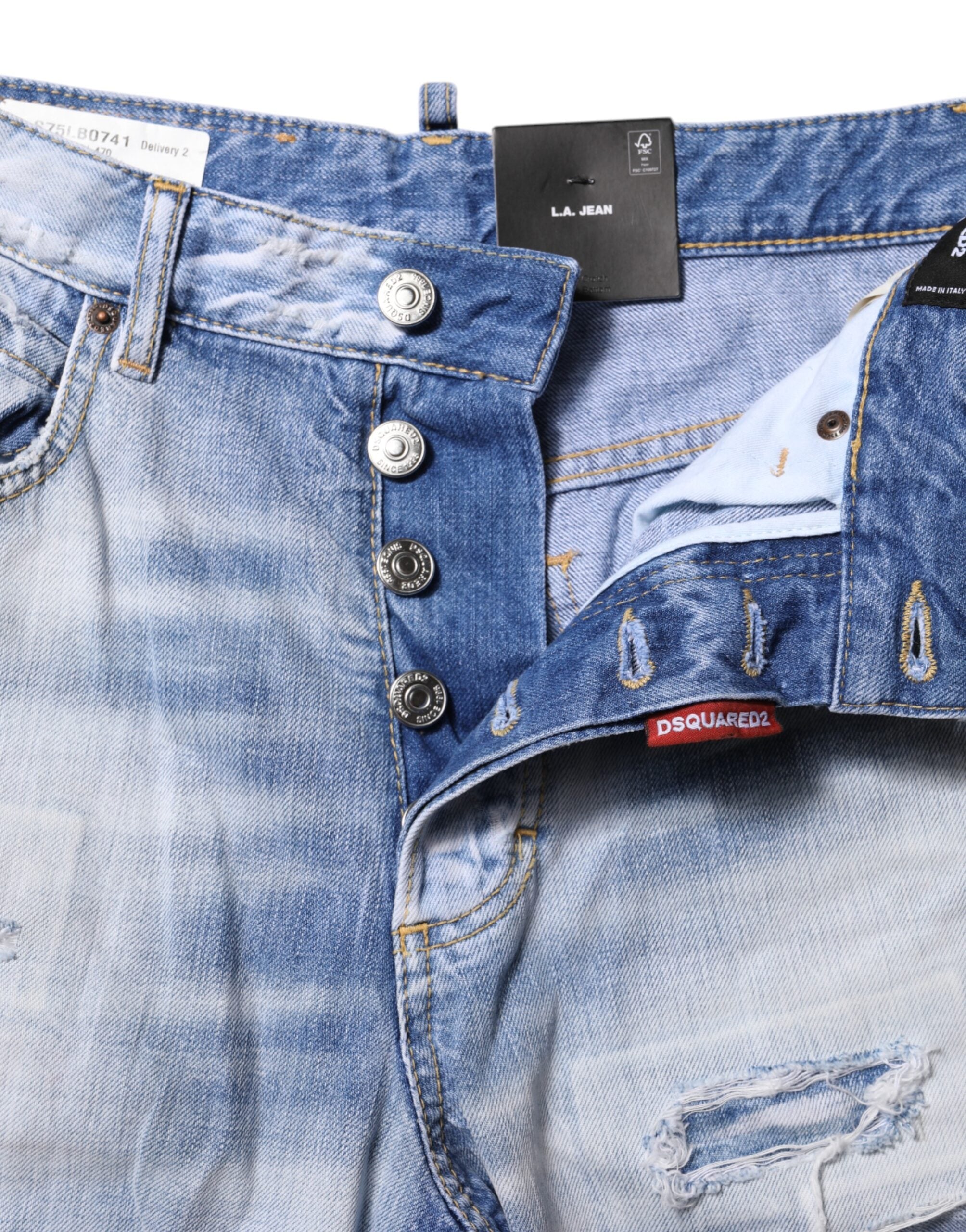 Blå tvättade jeans med hög midja och vida ben