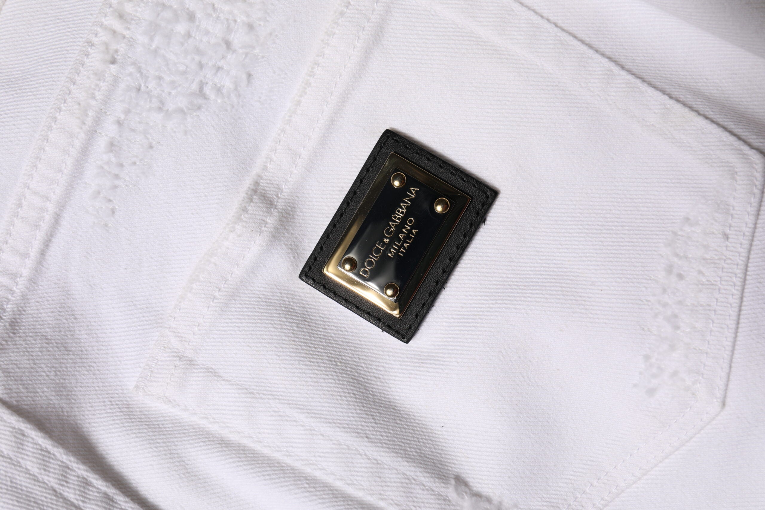 Vita slitna bomullsjeans med hög midja