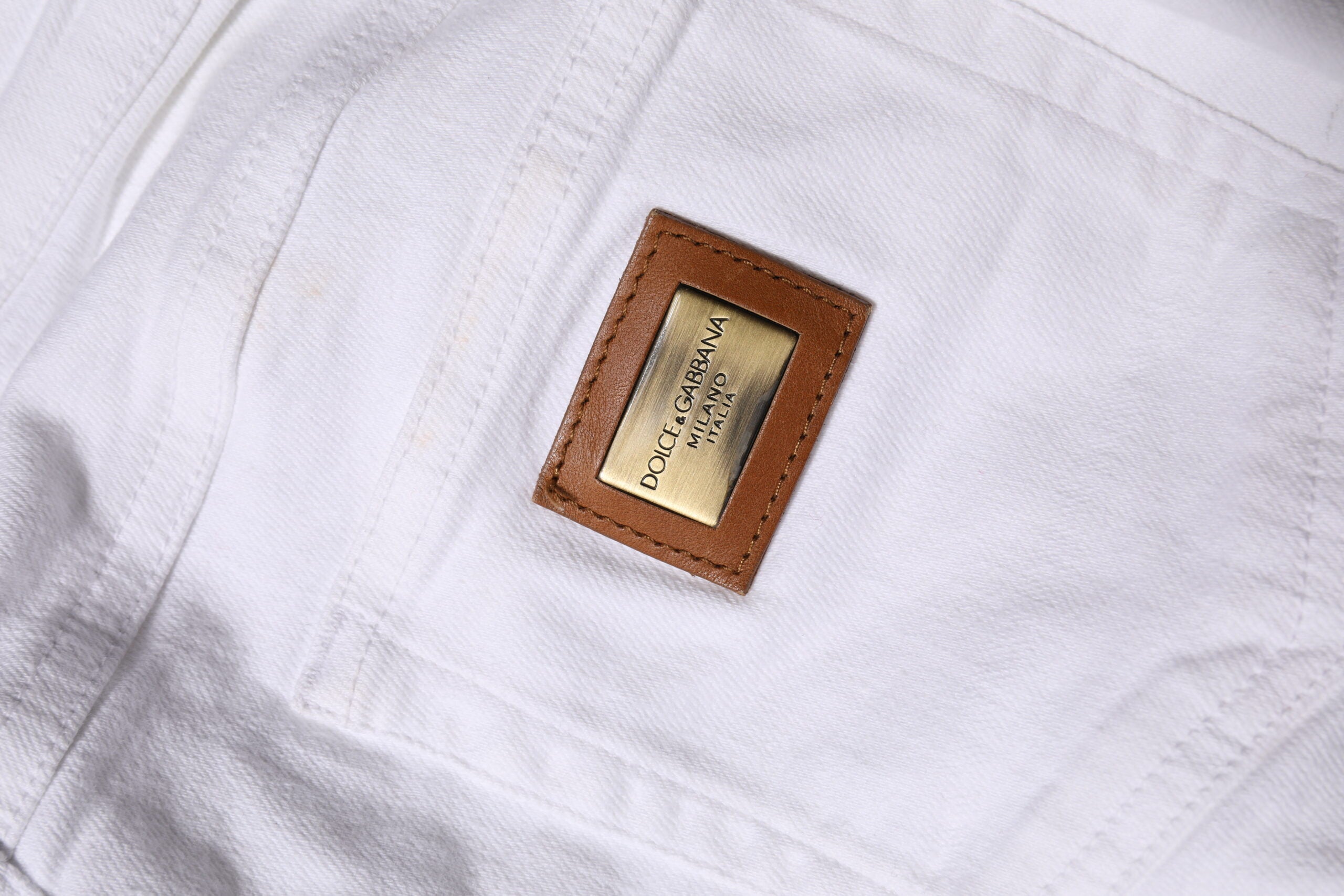 Vita bomullsjeans med låg midja och smal passform 