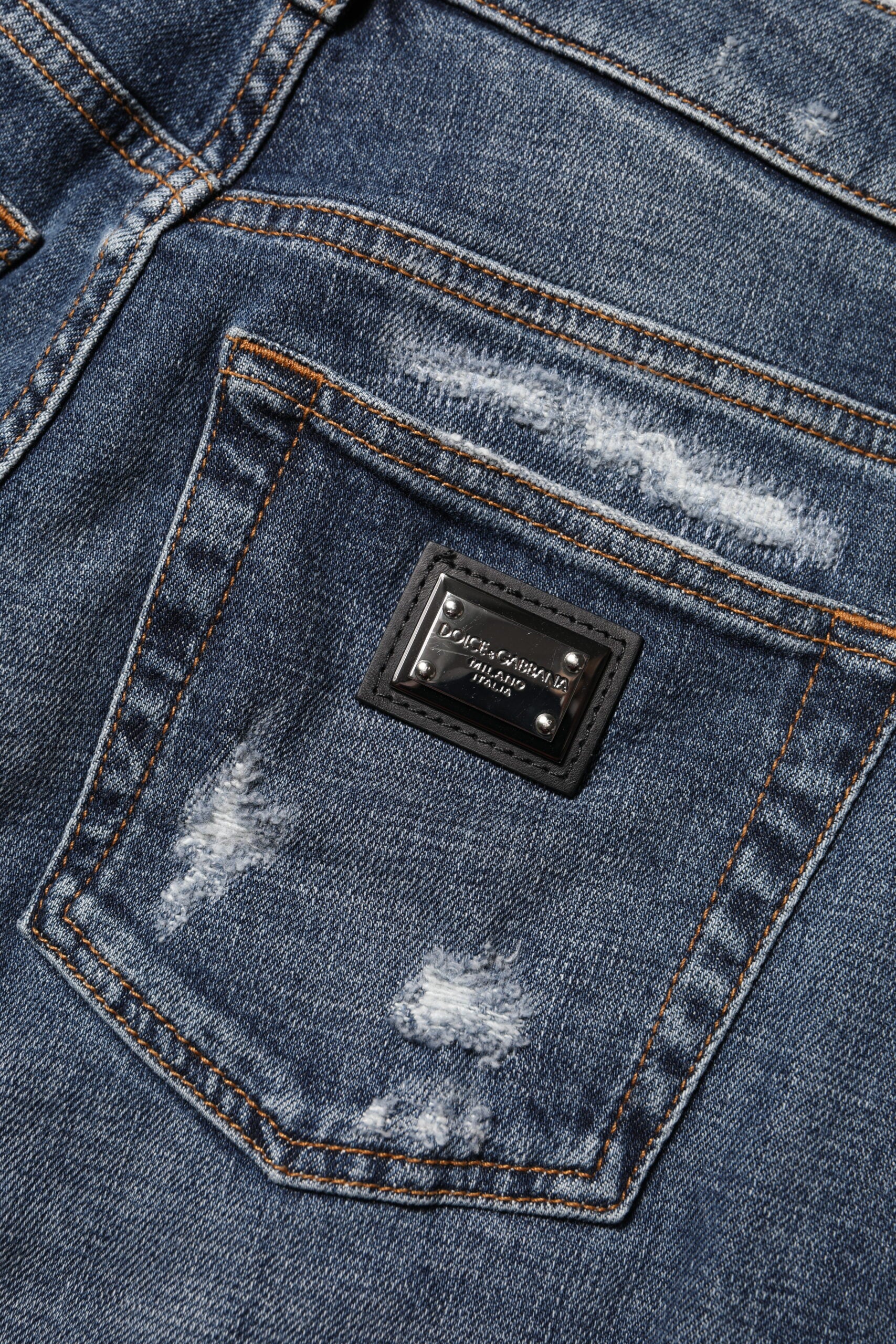 Blå bomullsfärgade boyfriend-jeans med slitna detaljer 