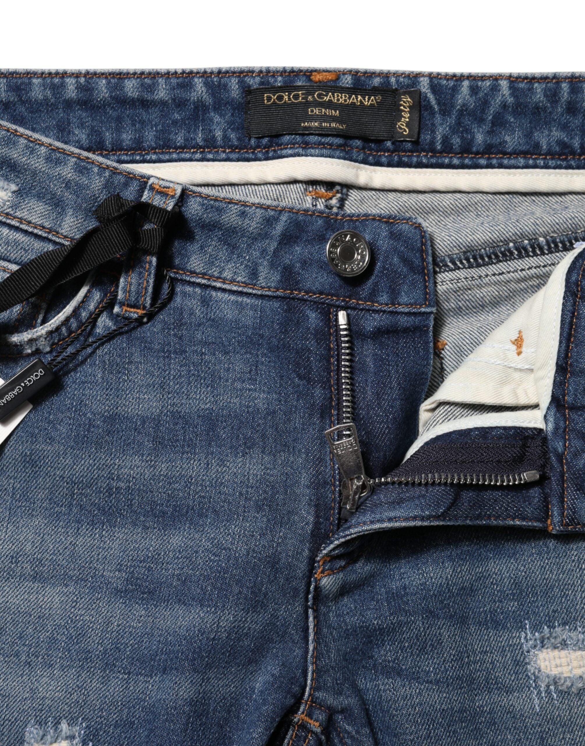 Blå skinny denimjeans med broderi og lekekort 