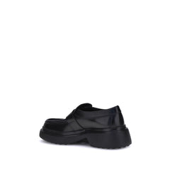 Tod's Black Rubber Platform Loafers