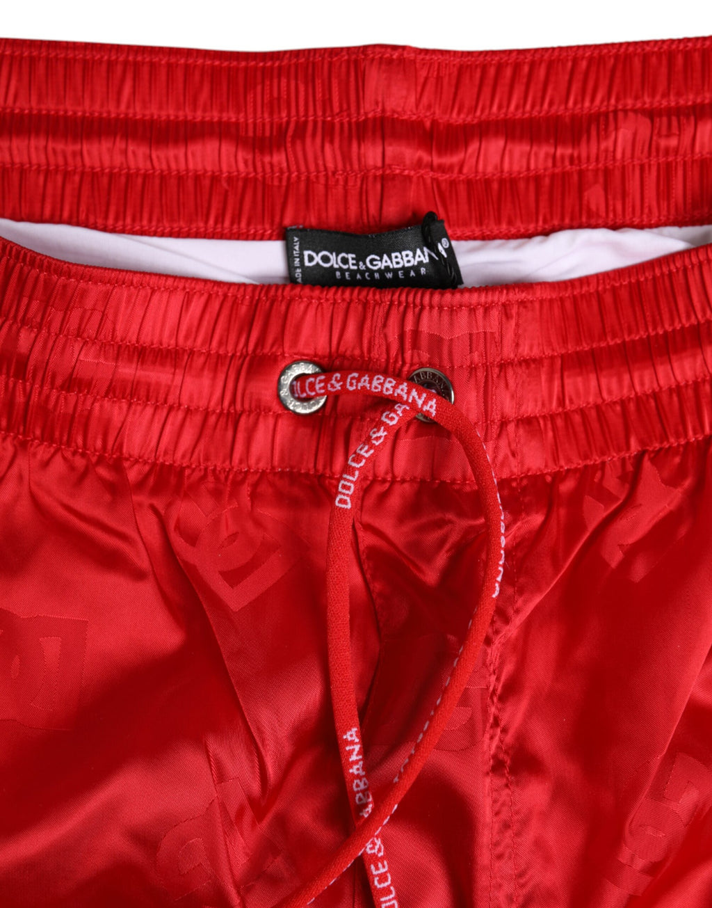 Röda badshorts med dragsko i nylon och badkläder