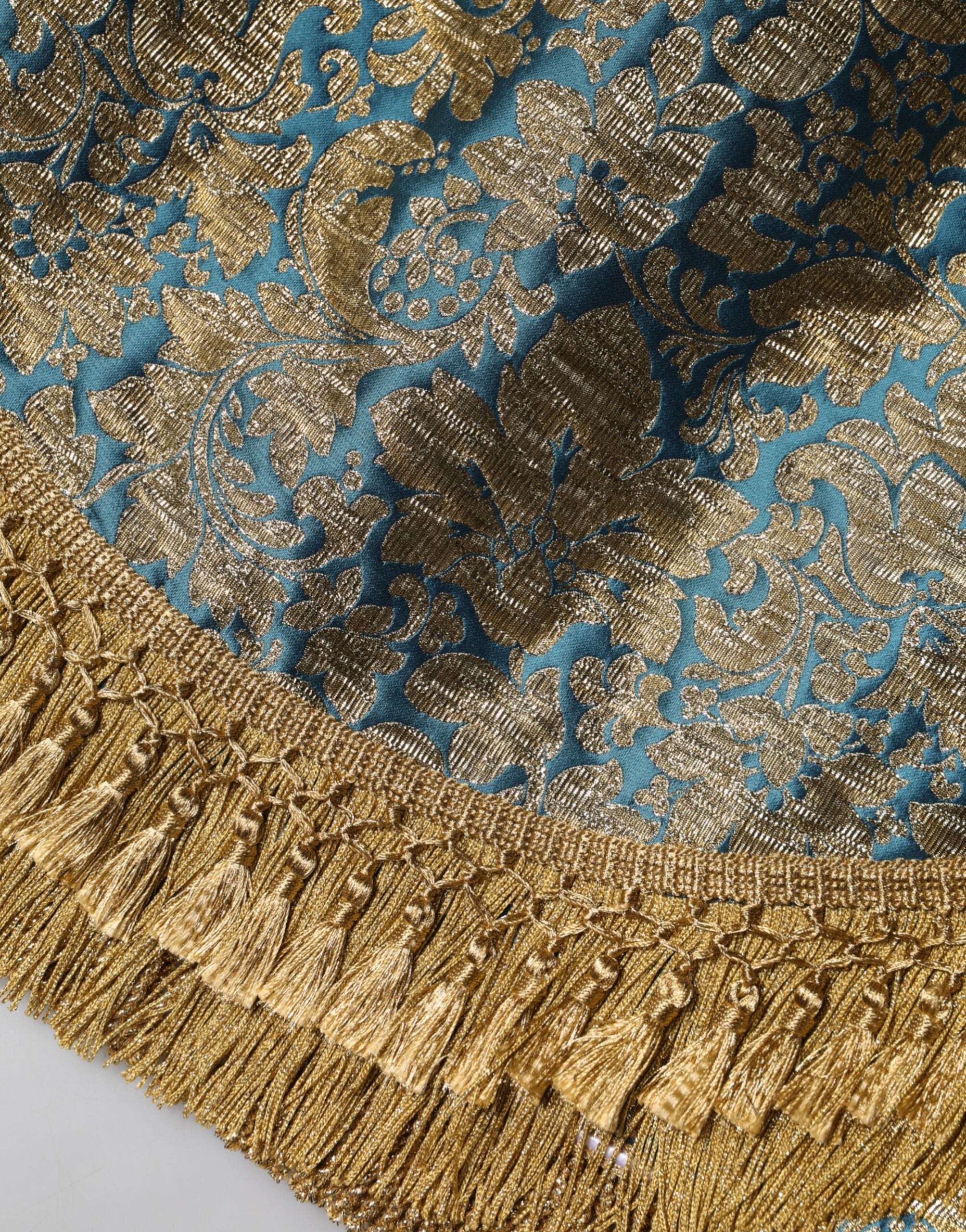 Blå blommig jacquard minikjol med tofsar
