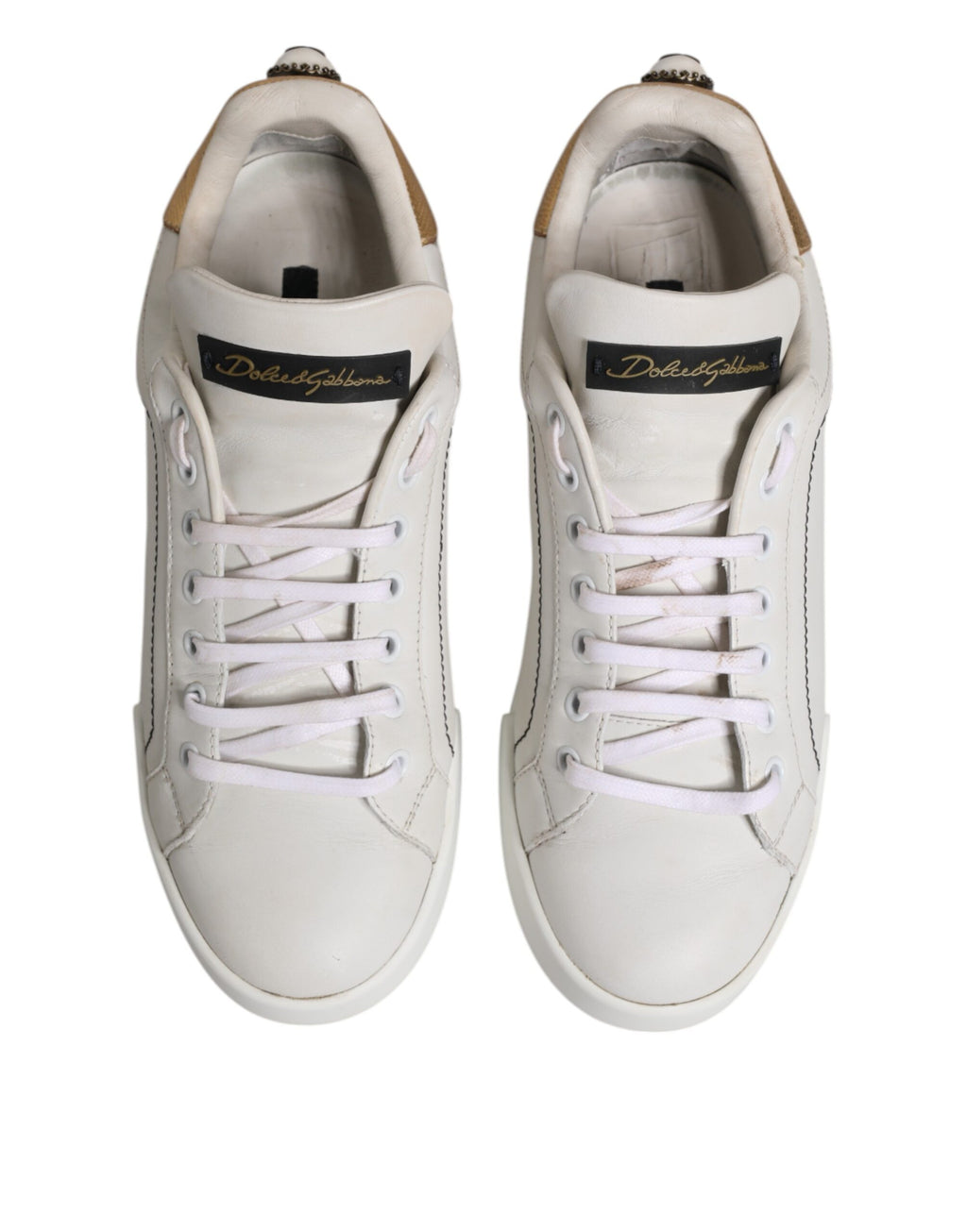 Låga sneakers i läder i vitguld