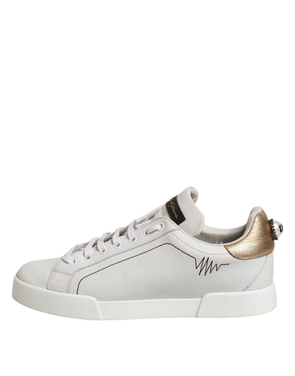 Låga sneakers i läder i vitguld