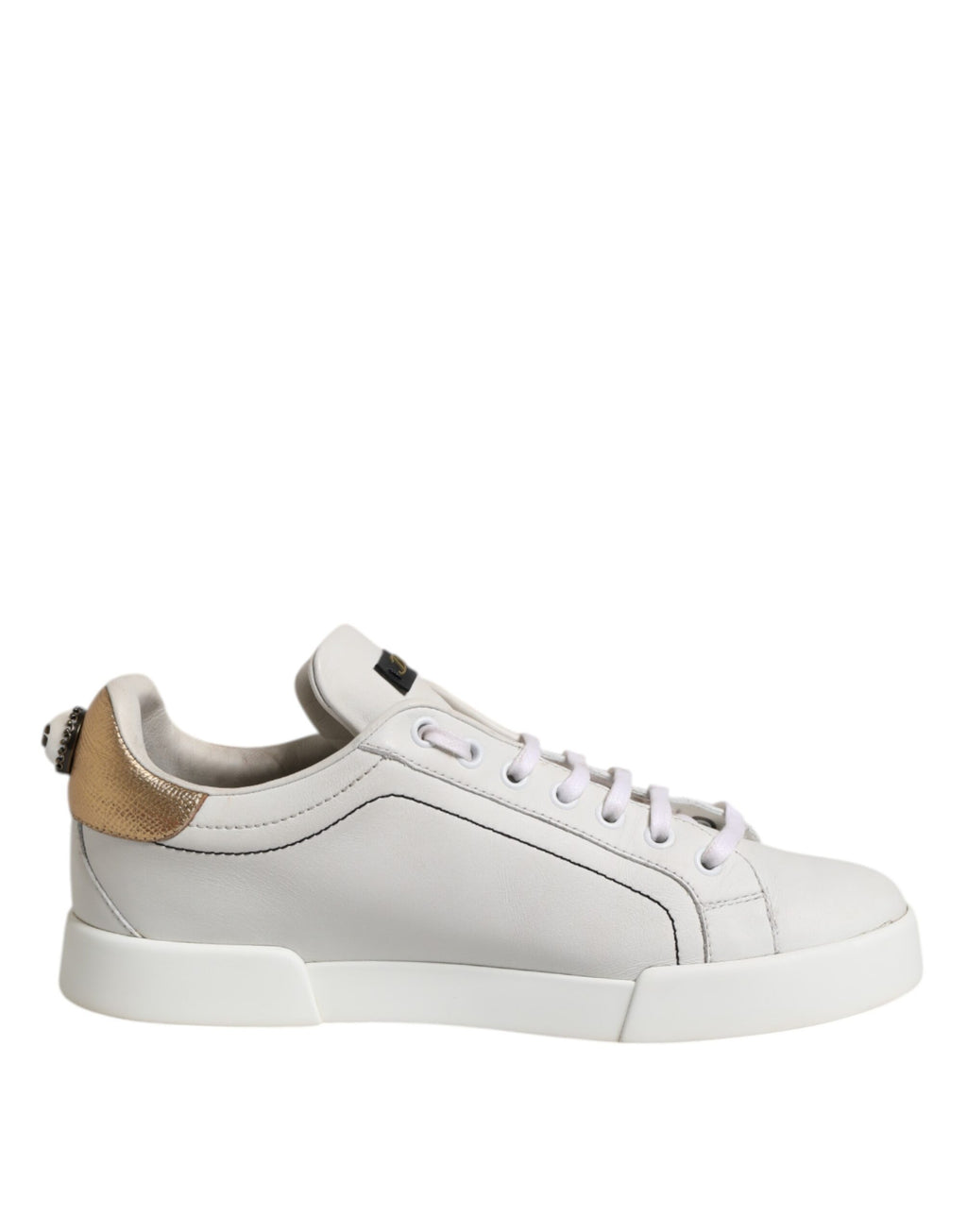 Låga sneakers i läder i vitguld