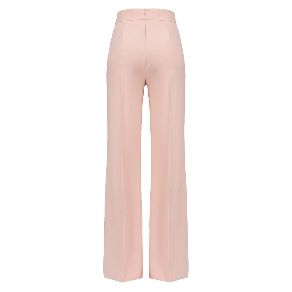 Rosa polyesterjeans och byxor