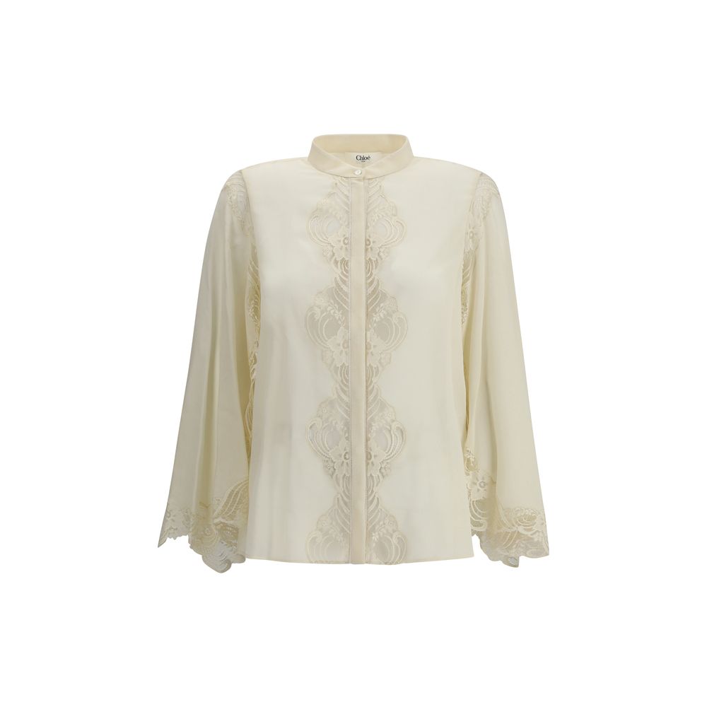 Blus i sidengeorgette och spets