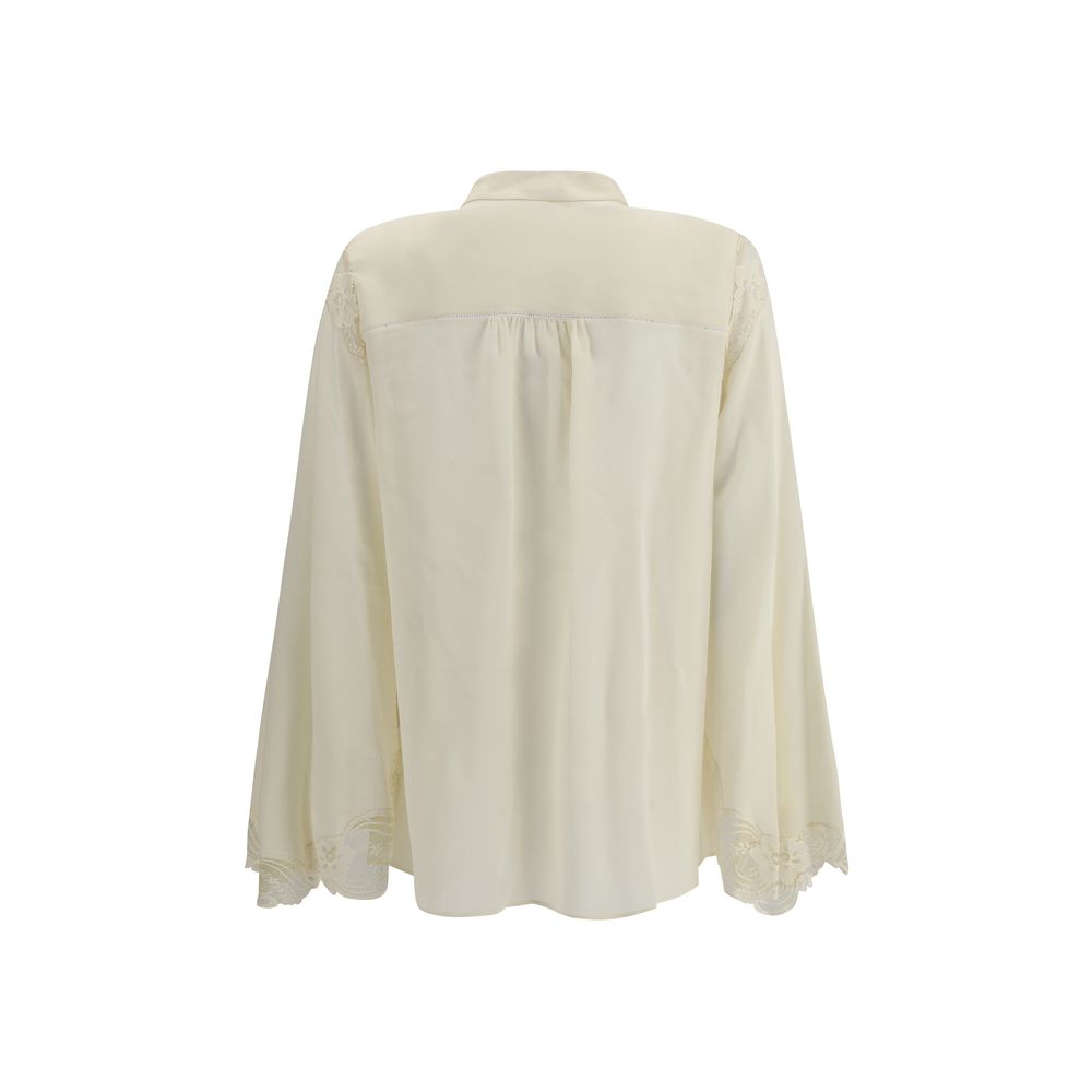 Blus i sidengeorgette och spets