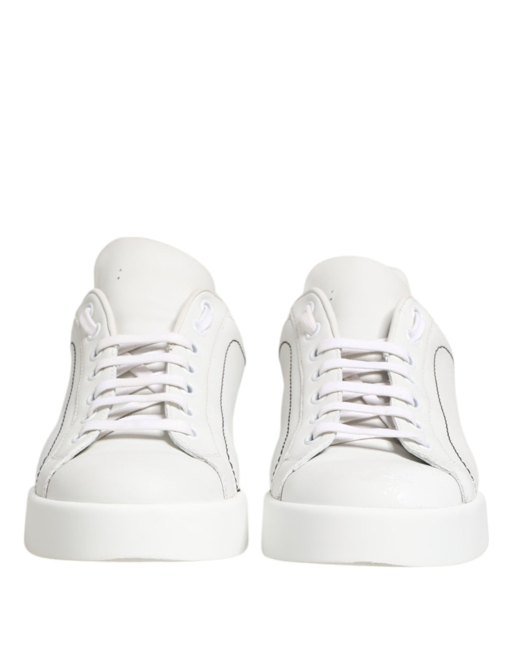 Låga sneakers i läder i vitguld