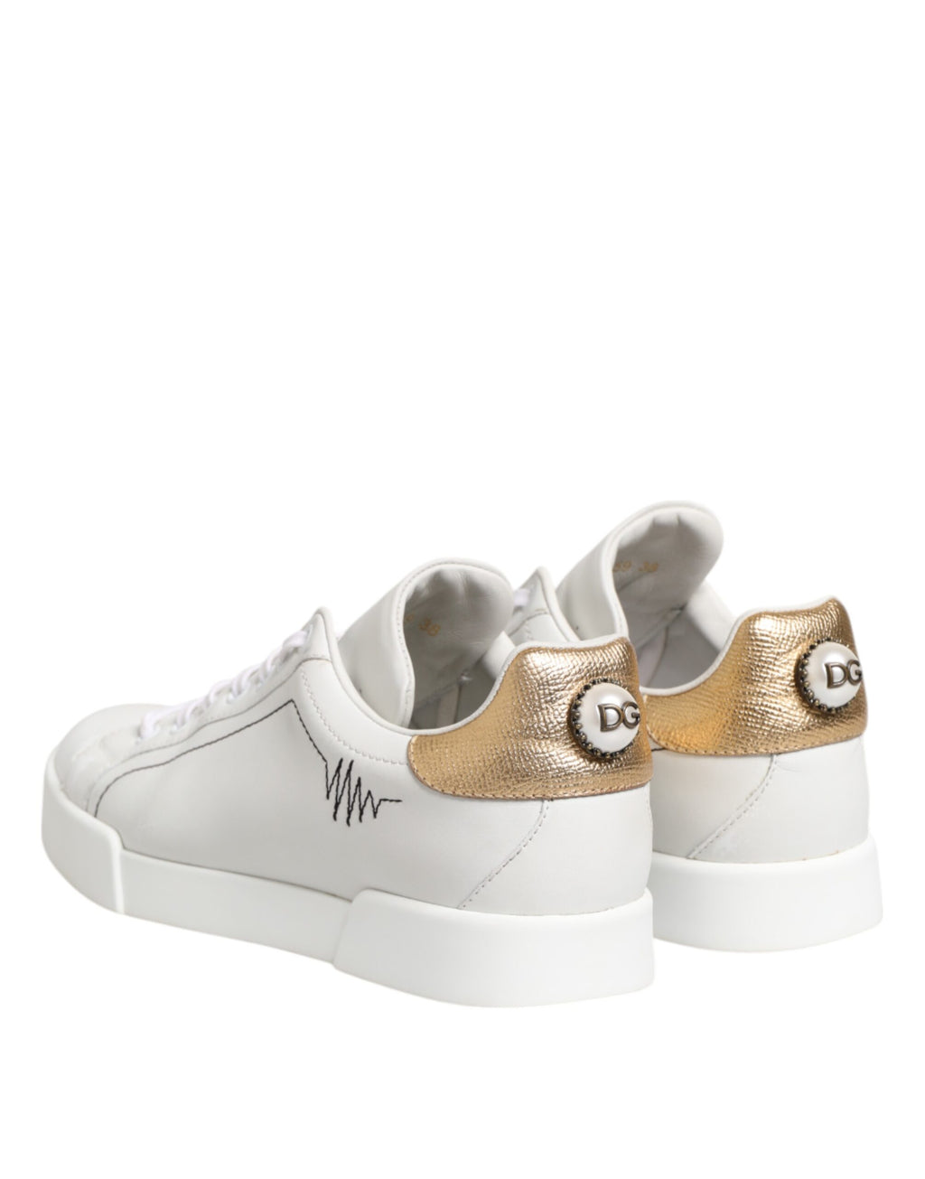Låga sneakers i läder i vitguld