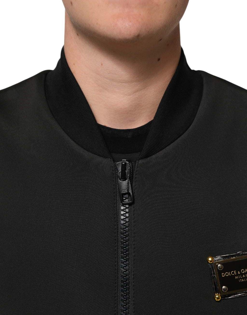 Svart bomberjakke i polyester med logoplakett