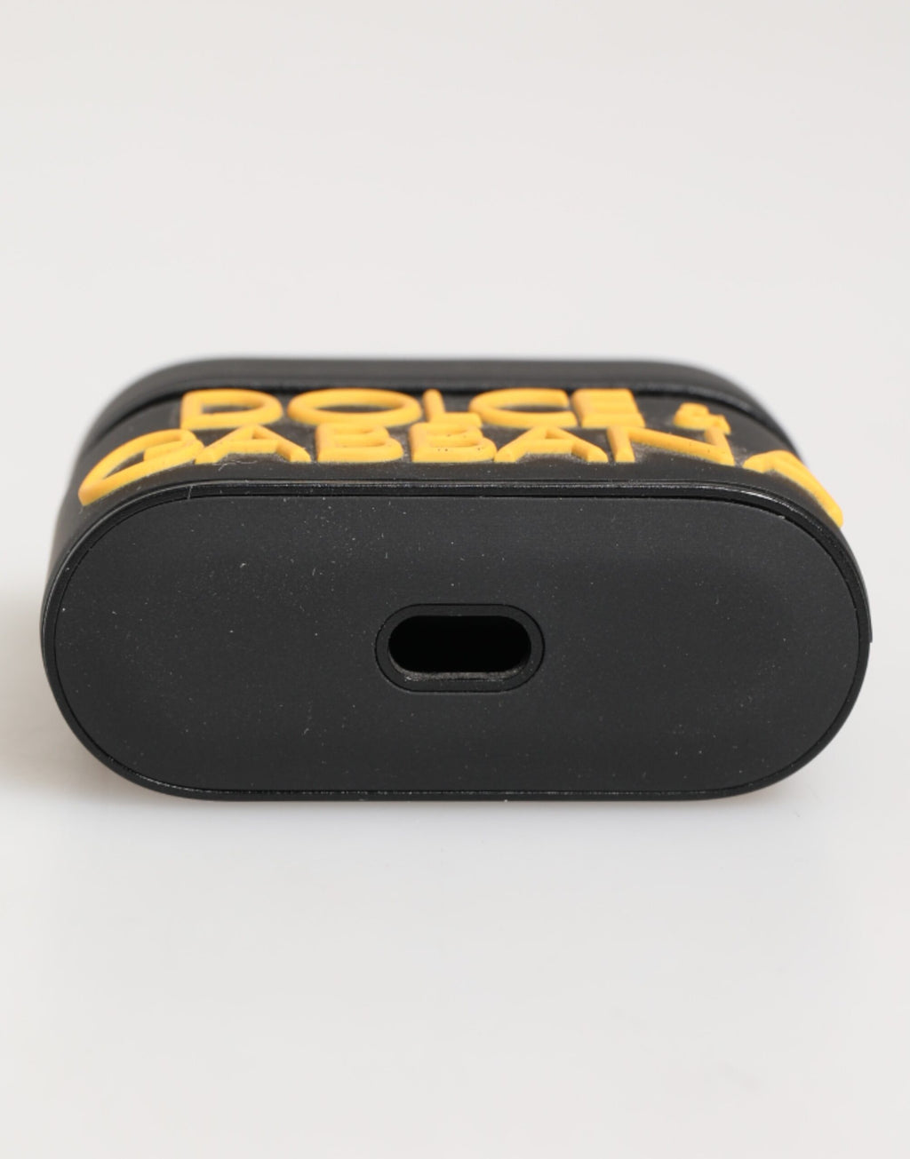 Svart gult gummi-logo-preget Airpods-tilbehørsdeksel