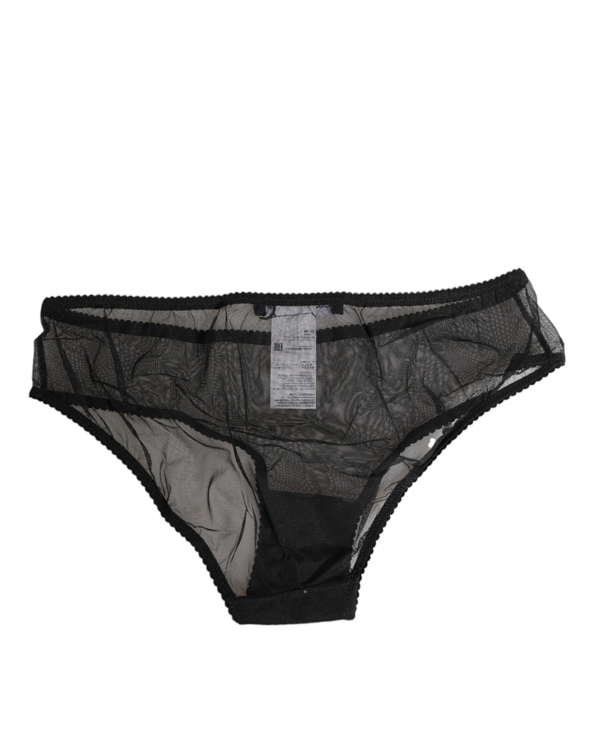 Svarta bikinitrosor i transparent mesh med spets