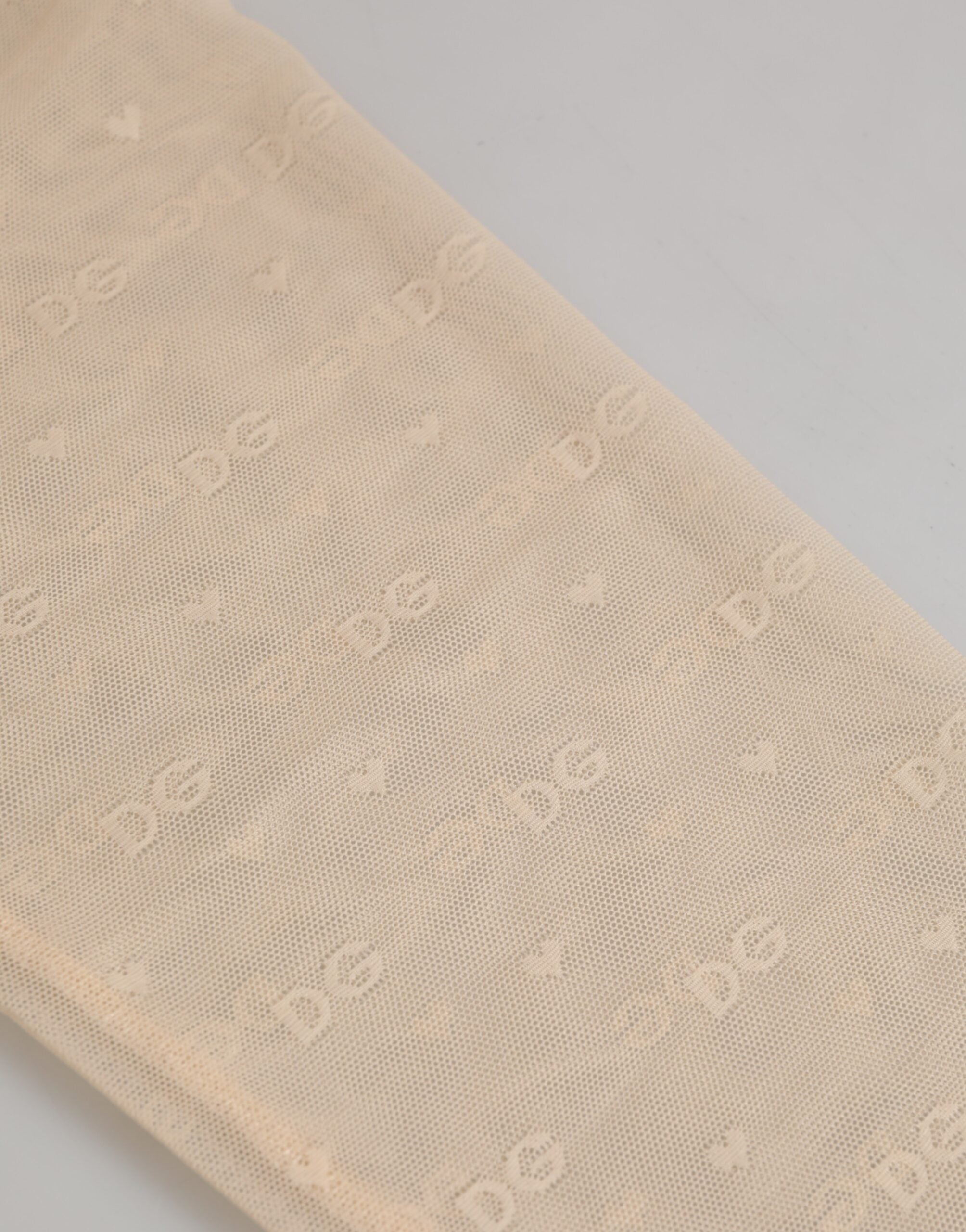 Beige nylonlogotypleggings med spetsunderkläder