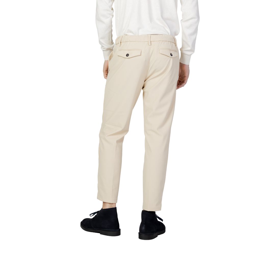 Beige nylonbyxor