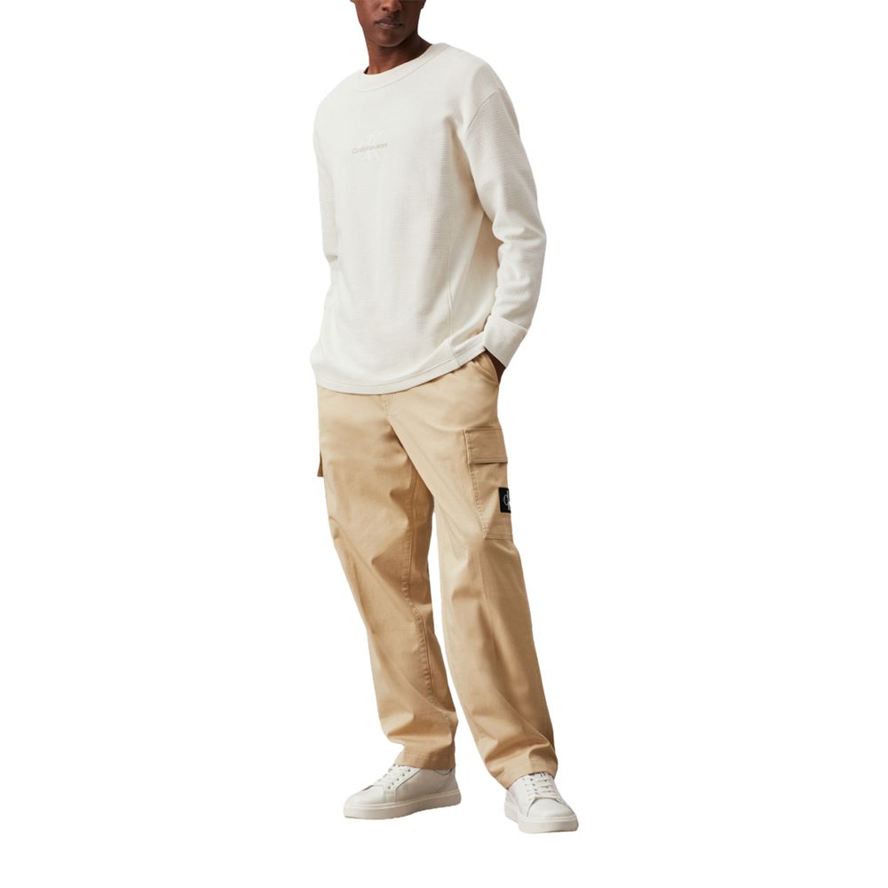 Beige byxor i återvunnen bomull